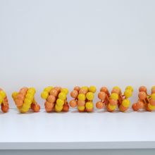 Six models of the 50 nm nucleosome fibre. Each model represents a different theoretical inter-nucleosomal spacing; nucleosomes are shown as yellow and orange spheres. Six models of the 50 nm nucleosome fibre. Each model represents a different theoretical inter-nucleosomal spacing; nucleosomes are shown as yellow and orange spheres.